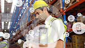 Animation of network of connections with icons over caucasian male worker in warehouse