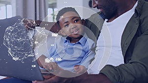 Animation of network of connections over happy african american father and son using laptop