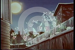 Animation of nine cat ghosts singing on fence