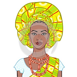 Animation portrait of the beautiful  black woman in a turban and ethnic jewelry. photo