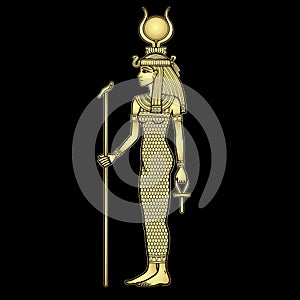 Animation portrait: Egyptian Goddess Isis holds symbols of power - a cross and a staff. Full growth.