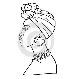 Animation portrait of the young African woman in a turban. Profile view. photo