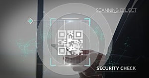 Animation of qr code scanner against caucasian businessman using digital tablet at office