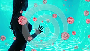 Animation of roses falling over biracial woman looking at water