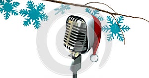 Animation of santa hat on vintage microphone and snow falling on white background