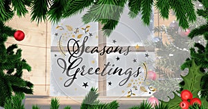 Animation of seasons greetings text over fir tree and window