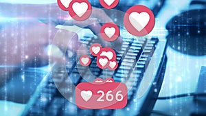 Animation of social media heart icons and numbers over computer keyboard