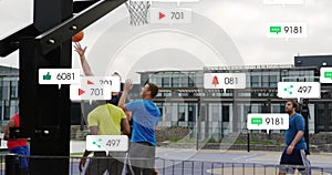 Animation of social media notifications over diverse male basketball players on outdoor court