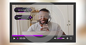 Animation of social media screen over african american man making video blog