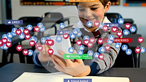 Animation of social media text on banners with digital icons over boy using smartphone