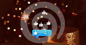 Animation of social media thumb up icons over christmas tree