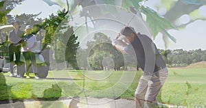 Animation of trees over senior caucasian couple playing golf on golf course