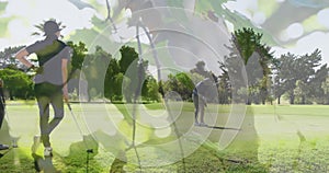 Animation of trees over senior caucasian couple playing golf on golf course