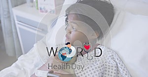 Animation of world health day text and logo over african american girl with soft toy in hospital bed