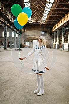 Anime style blonde lady with colorful air balloons