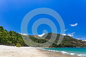 Aninuan beach, Puerto Galera, Oriental Mindoro in the Philippines, white sand, coconut trees and turquoise waters, landscape view photo