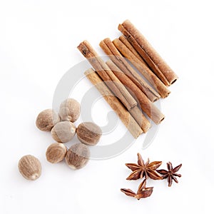 Anise and cinnamon on white background