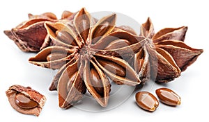 Anise star and aniseeds, spice with strong taste used in cooking, isolated on white background