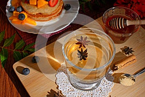 Anise tea to accompany breakfast of hotcakes photo