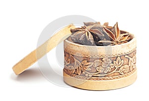 Anise in a wooden box Dried star anise spice fruits