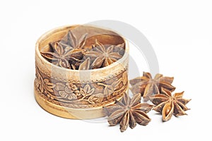 Anise in a wooden box Dried star anise spice fruits