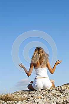 Anjali Mudra in lotus position photo