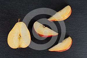 Anjou red pear on grey stone