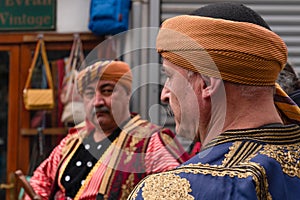 Ankara, Turkey - March 04 2022: Two Seymens brave man of central Anatolia in traditional clothes. Selective focus