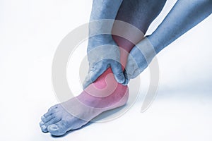 Ankle injury in humans .ankle pain,joint pains people medical, mono tone highlight at ankle