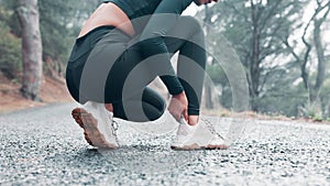 Ankle, pain and hands of woman outdoors for workout with discomfort or foot injury while running for morning routine