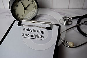 Ankylosing Spondylitis write on a paperwork isolated on office desk. Healthcare/medical concept