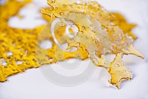 Annabis oil concentrate aka shatter with glass rig
