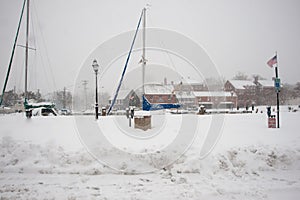 Annapolis street scene across harbor during blizzard