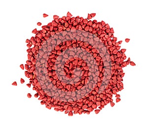 Annatto seeds, isolated on a white background. Achiote seeds, bixa orellana. Natural dye for cooking and food. Close-up