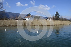 Annecy lake and mountains, landscape in Savoy