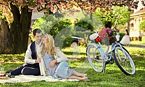 Anniversary concept. My darling. Idyllic moment. Man and woman in love. Picnic time. Spring date. Playful couple having