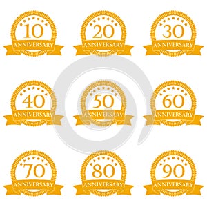 Anniversary icon set. Emblems and stamps with ribbon. 10,20,30,40,50,60,70,80,90 years design elements. Vector illustration