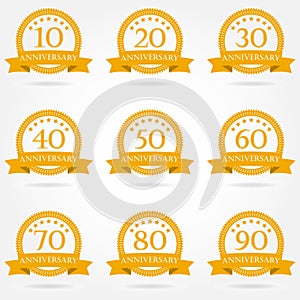 Anniversary icon set. Emblems and stamps with ribbon. 10,20,30,40,50,60,70,80,90 years design elements. Vector illustration