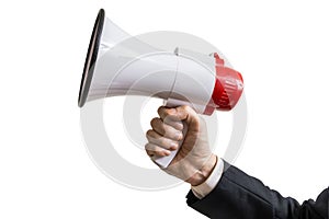 Announcement concept. Hand holds megaphone. Isolated on white background photo