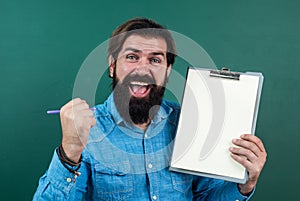 Announcement. happy man with beard holding notebook. troubles in studying. formal education. male student at school