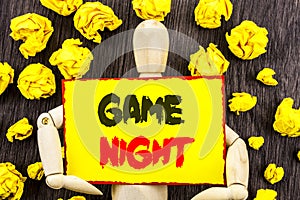 Announcement text showing Game Night. Concept meaning Entertainment Fun Play Time Event For Gaming written on Sticky Note Holding