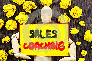 Announcement text showing Sales Coaching. Concept meaning Business Goal Achievement Mentoring written on Sticky Note Holding By Sc