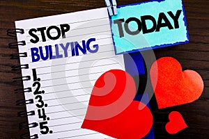 Announcement text showing Stop Bullying. Concept meaning Awareness Problem About Violence Abuse Bully Problem written on notebook