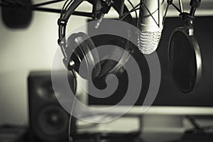 Announcer microphone on recording studio background