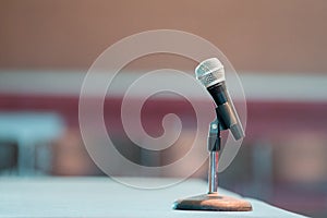 Announcer microphone on table before boxing ring