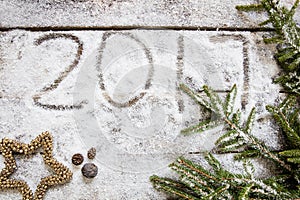 Announcing 2017 on winter snow background for holiday, top view