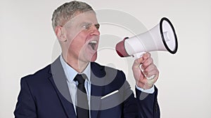 Announcing Senior Businessman Shouting Through a Megaphone, White Background