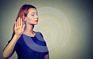 Annoyed angry woman with bad attitude giving talk to hand gesture