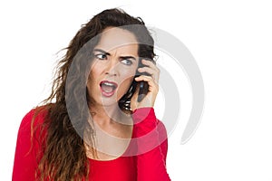 Annoyed angry woman talking on the phone