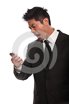 Annoyed Asian Man yelling at his phone